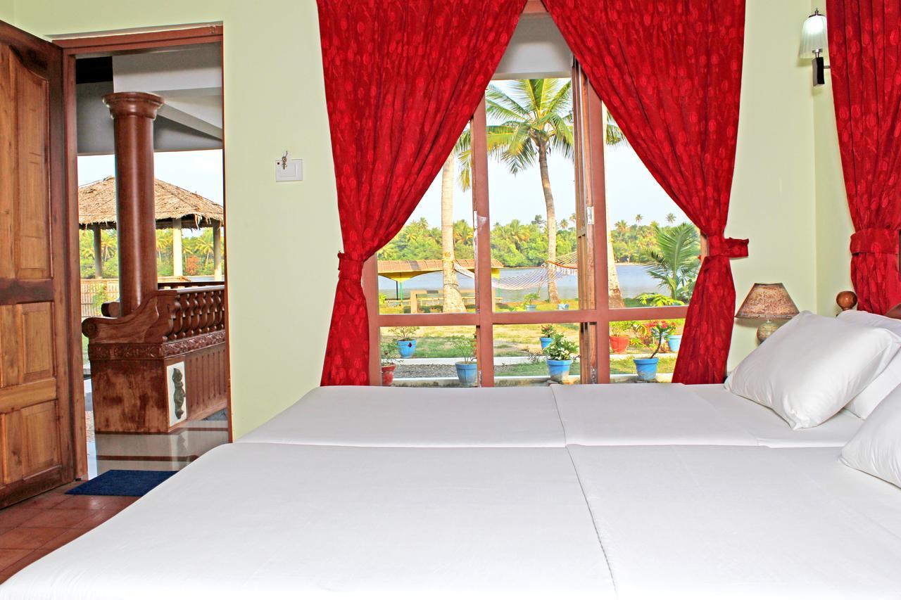 Breeze Backwater Homes Kochi Rum bild